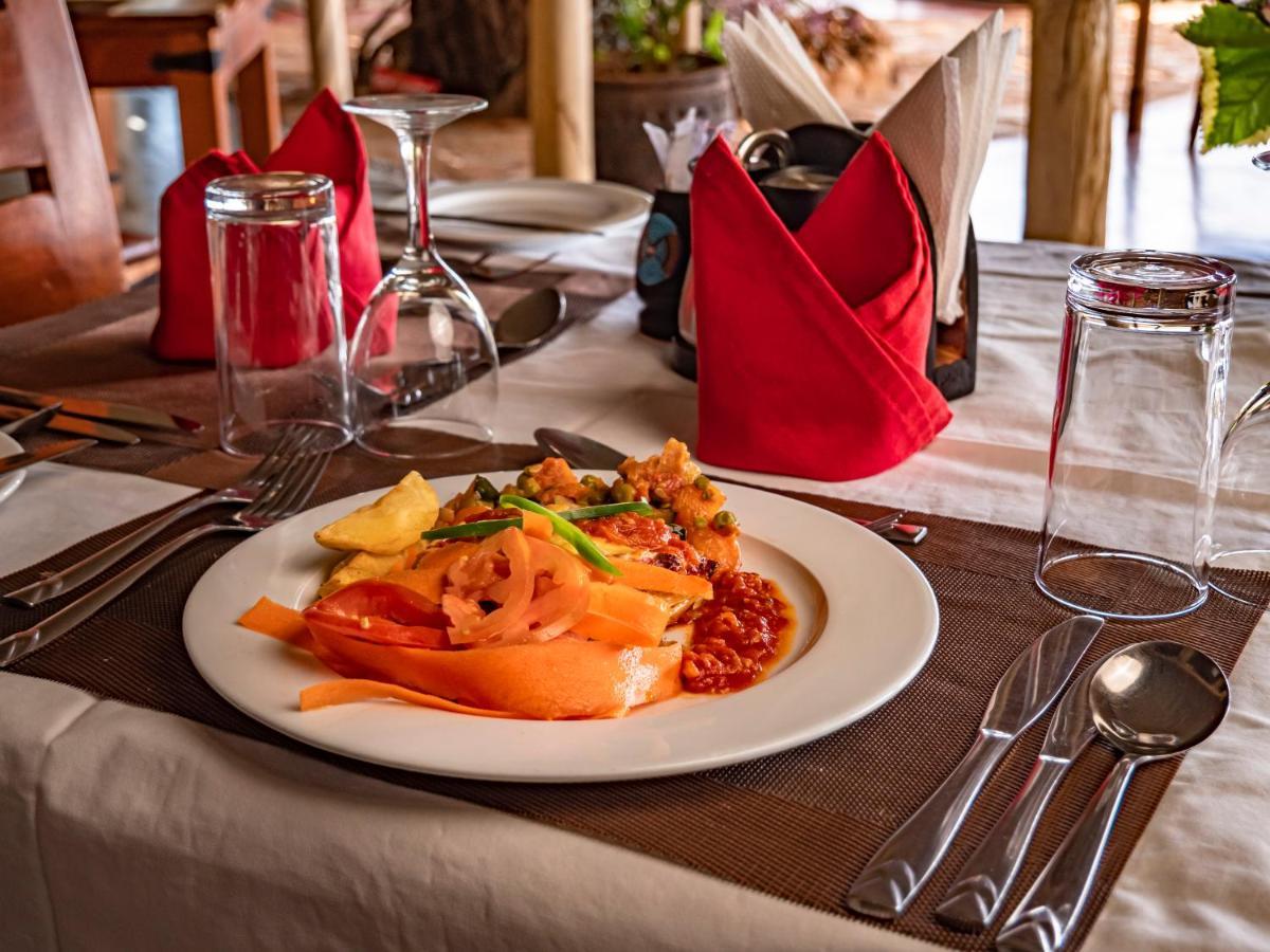 Отель Tulia Amboseli Safari Camp Экстерьер фото